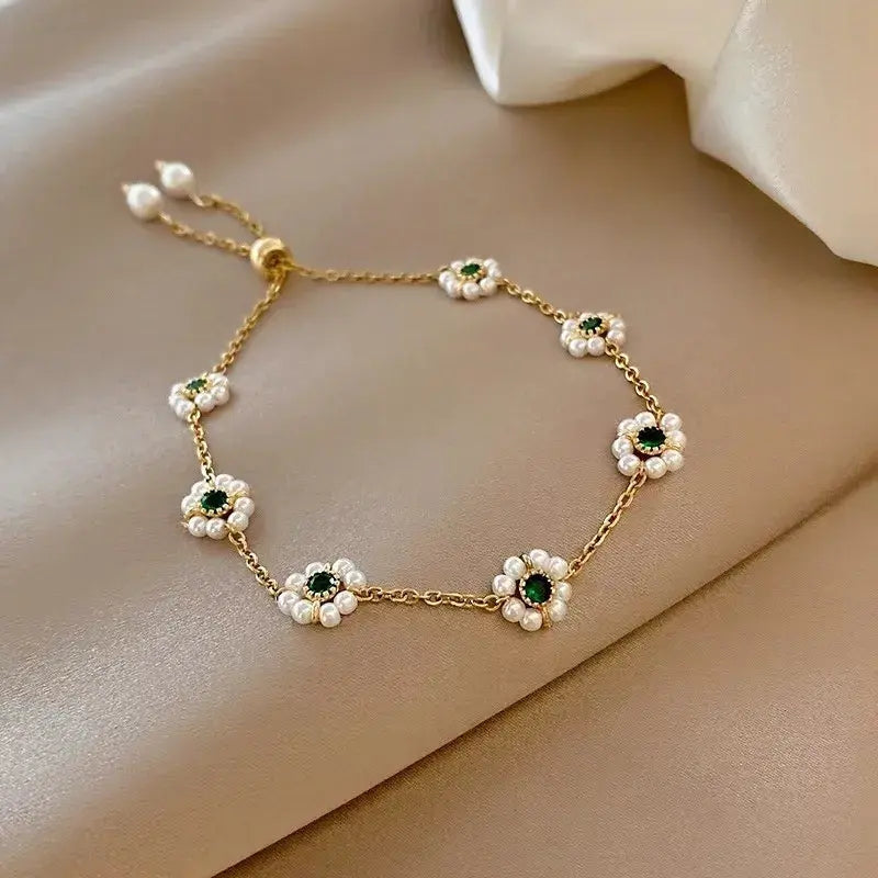 Elegantní náramek se zelenými krystaly | Zlato