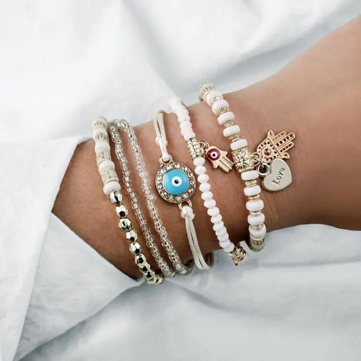 Souprava náramků Hamsa | Zlato